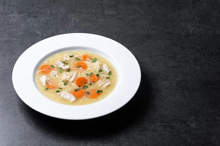 chicken-soup-with-vegetables-black-slate