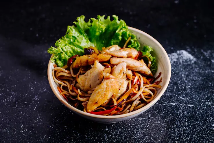 chinese-noodles-inside-bowl-with-fillet-lettuce