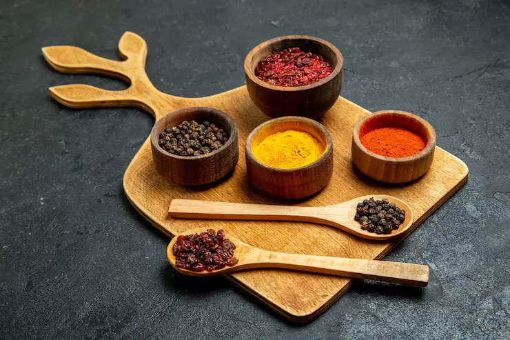 front-view-different-seasonings-grey-space